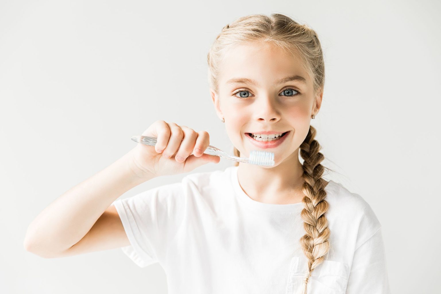 girl with toothbrush copy Childrens Dental Zone